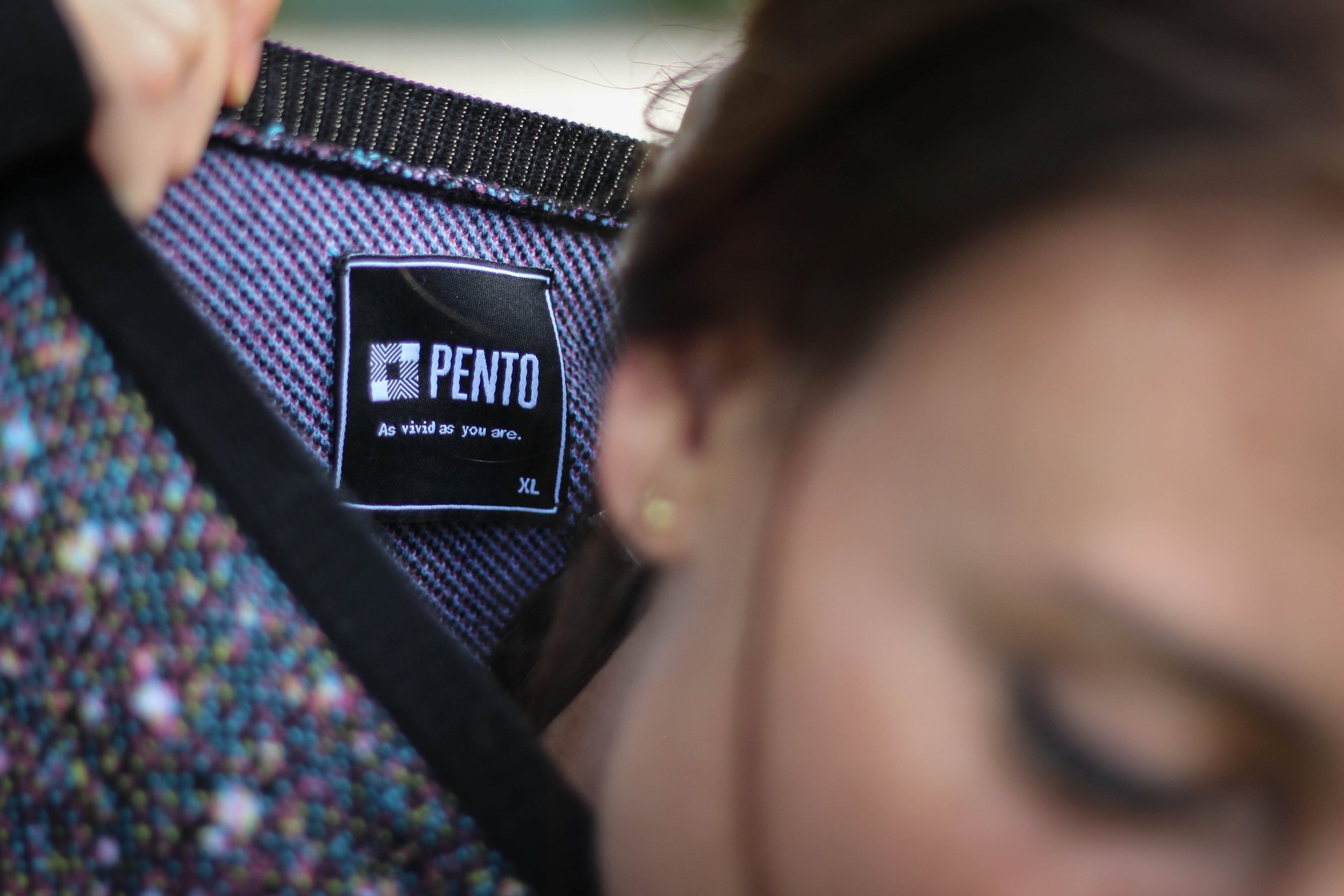 Pento jumper in mineral pattern, photographed against neutral backdrop